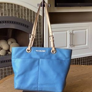 Michael Kors blue leather purse.